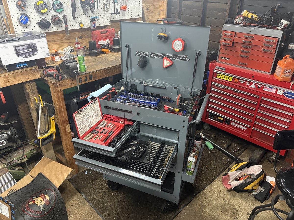 U.S. General cart in active garage workflow with drawers open
